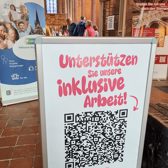 Plakat mit QR Code zur Spendenmöglichkeit